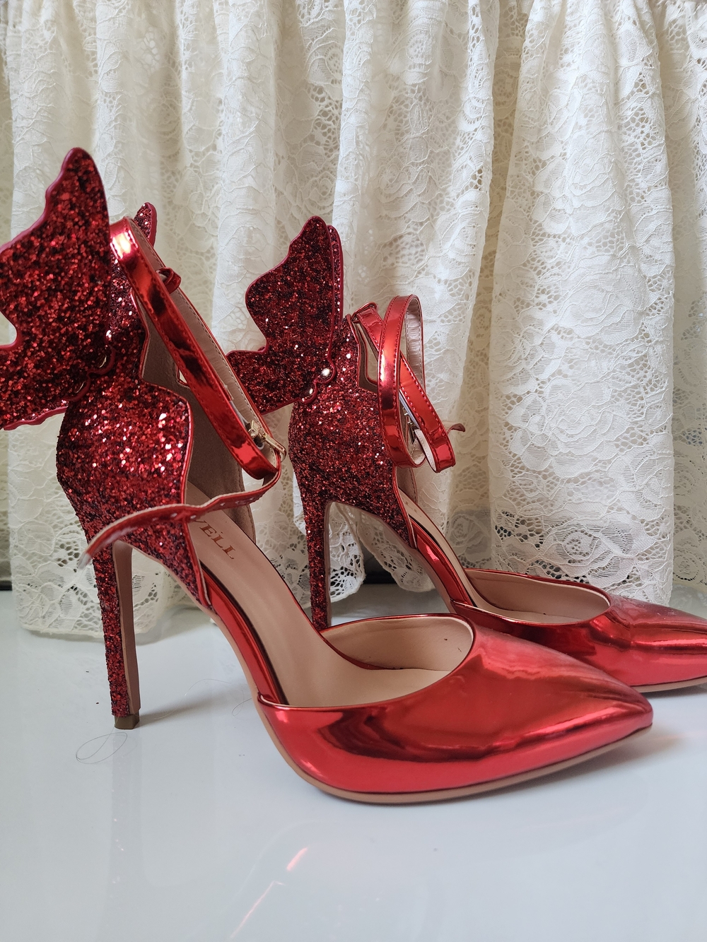 Shimmer Red Wing-Accent High Heel Pumps